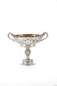 A late Victorian silver tazza by Holland, Aldwinckle & Slater, London 1900, with a beaded border