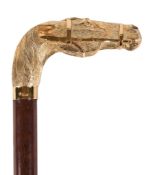 Asprey, a silver gilt mounted walking stick by Asprey & Co., London 1986, the handle cast as a
