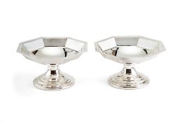 Asprey, a pair of silver octagonal pedestal sweet dishes by Asprey, Birmingham 1989, on circular