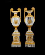 A pair of rock crystal and gilt metal mounted urns on plinths, in Neoclassical taste, 20th century,