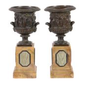 A pair of Continental patinated bronze and marble mounted models of the Borghese Vase, late 19th