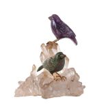 A rock crystal, amethyst and bloodstone bird ornament, the carved amethyst and bloodstone birds