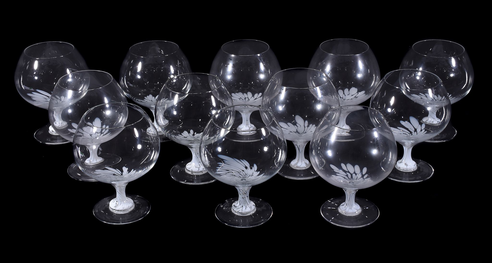 Twelve Rosenthal Studio Linie brandy balloon glasses, clear glass and supported on stems with