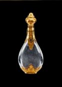A French 18 carat gold mounted clear glass scent bottle, maker's mark illegible, eagle head