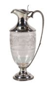 Asprey, a silver mounted clear glass claret jug by Asprey Plc, London 1991, in classical revival