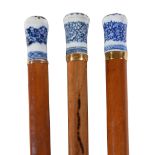 Three various blue and white porcelain mounted malacca walking canes, 19th century, with yellow