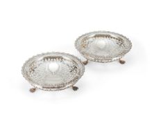 A pair of Edwardian silver sweet dishes, by James Dixon & Son, Sheffield 1903 and 1904, one over