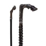 An early 20th century silver and horn walking stick , circa 1900, the grip carved as a horse's hoof