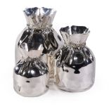 Asprey, three graduated silver plated vases by Almazan, each in the form of an open drawstring bag,