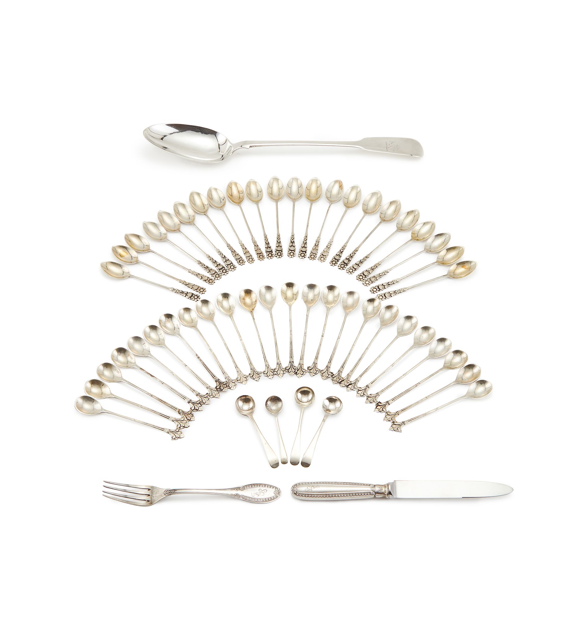 A collection of silver and silver coloured flatware, to include: a Victorian fiddle pattern serving