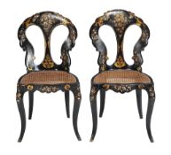 Ω A pair of Victorian black lacquer, parcel gilt and mother-of-pearl inlaid side chairs , circa