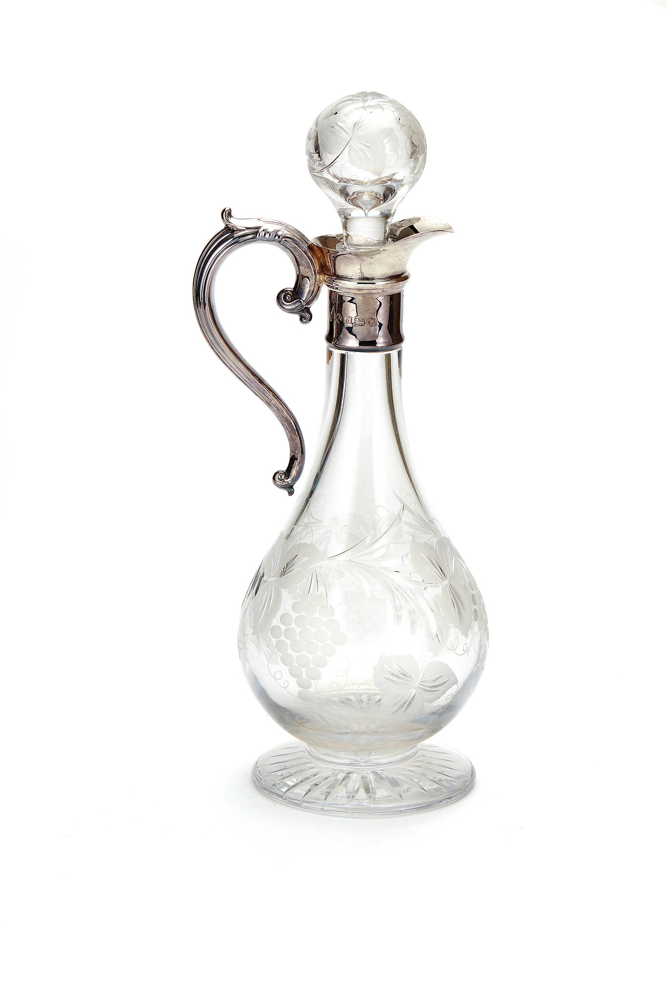 Asprey, a silver mounted cut and etched glass claret jug by Asprey Plc, London 1990, with a