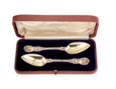 A cased pair of French silver gilt spoons by Theophile-Desire Pichon, circa 1840, the handles