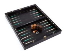 Ω A German ebony and ivory veneered games box, 18th century, the exterior chequer inlaid within a