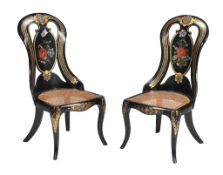 Ω A pair of Victorian black lacquer, parcel gilt and mother-of-pearl inlaid side chairs , circa