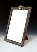 A large Edwardian silver mounted dressing table mirror by Henry Matthews, Birmingham 1903,