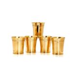 A set of five 22 carat gold beakers by How of Edinburgh Ltd, London 1966, slightly tapered and