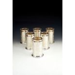 Asprey, a set of six silver cylindrical bottle holders by Asprey, London 1995, pierced and engraved