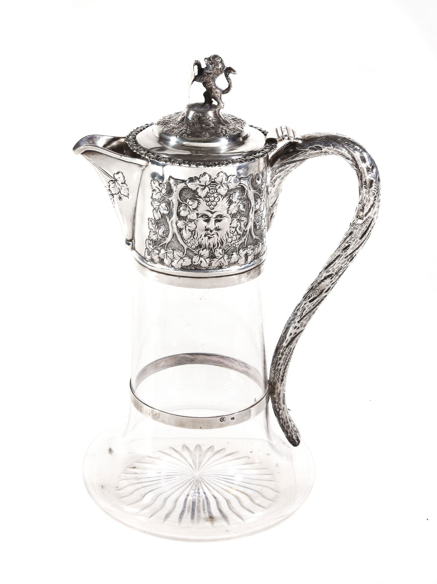 A Victorian silver mounted clear glass claret jug by Charles Boyton II, London 1887, the rampant