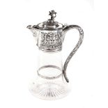 A Victorian silver mounted clear glass claret jug by Charles Boyton II, London 1887, the rampant