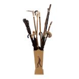 A quantity of assorted walking sticks, late 19th and 20th century, including a substantial Italian