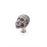 A silver coloured novelty bottle stopper or walking stick handle, unmarked, early 20th century,