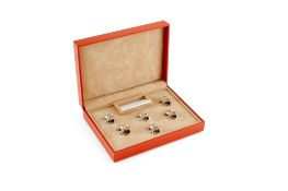 A set of six silver plated frog menu holders by Saint Hilaire, in an orange Saint Hilaire case,