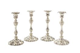 A set of four electro-plated candlesticks, possibly by William & George Sissons, with shaped