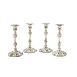 A set of four electro-plated candlesticks, possibly by William & George Sissons, with shaped