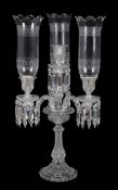 A modern Baccarat press-moulded and clear glass four-light table candelabrum, stencil mark, with