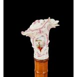 A German porcelain mounted bamboo cane, 19th century, with Rococco style mount and horn ferrule,