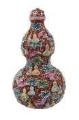 A rare large Chinese moulded porcelain 'double-gourd and bats' snuff bottle and stopper, Qing