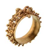 A gold granulated bangle, Abbasid/Ilkhan period, the bangle with three rows of granulated birds to