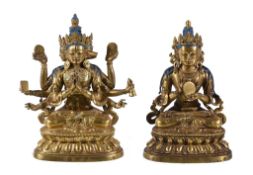 Two Sino-Tibetan gilt-bronze figures, China or Tibet, 18th century or later, both seated in