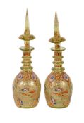 A pair of pale-yellow and enamelled bottles and stoppers for the Eastern market, late 19th century,