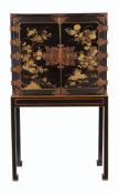 A black lacquer and gilt japanned cabinet on stand, in mid-18th century style , 20th century,