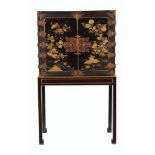 A black lacquer and gilt japanned cabinet on stand, in mid-18th century style , 20th century,