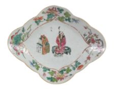 A Cantonese Famille Rose footed dish, circa 1860-1880, of shaped lozenge form, the centre painted