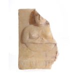 A fragmentary South Arabian figural plaque, circa 2nd-1st century BC, carved in relief with a