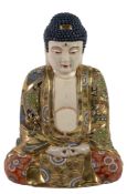 A large Japanese Satsuma style Buddha, with coloured enamels and gilded decoration, 48cm high