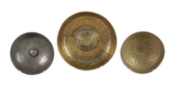 Three talismanic Persian metal bowls, 18th or 19th centuries, one with Sotheby's lot ticket 552 but