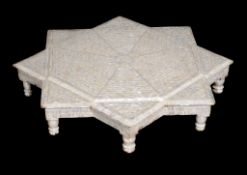 Ω A Middle Eastern mother-of-pearl veneered low table , of octogonal form, 17cm high, 92cm wide