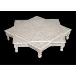 Ω A Middle Eastern mother-of-pearl veneered low table , of octogonal form, 17cm high, 92cm wide