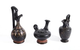 Three black glazed pottery vessels, Greek South Italy, circa 4th-3rd century BC, including: a