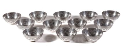 A set of twelve Egyptian silver finger bowls, Cairo 1928-29, .900 standard, with beaded rims, the