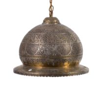 A Mamluk style circular white metal inlaid lamp, probably Egypt or Syria, 19th century, inlaid with