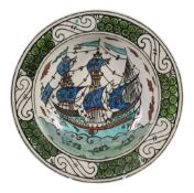 A Continental pottery Iznik style 'Galleon' dish , late19th or early 20th century, decorated in