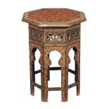 A Kashmiri folding table and stand, the detachable top painted with flower and with script border,