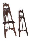 Ω Two hardwood and carved and mother-of-pearl inlaid Islamic style easels , of recent