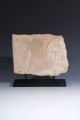 An Egyptian limestone relief fragment, Ramesside, 19th Dynasty, circa 1290-1200 BC, carved in sunk